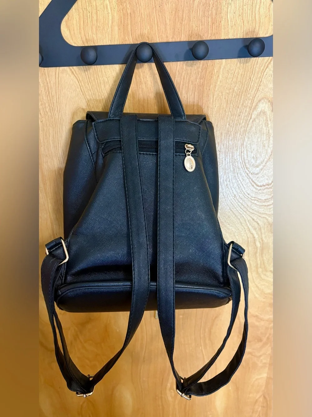 Black faux leather with gold detailing